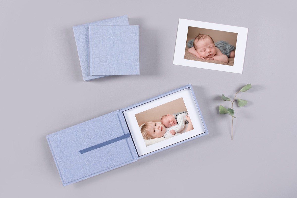 Fotos in Foliobox und Alben